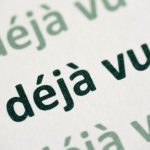 Word déjà vu printed on white paper macro