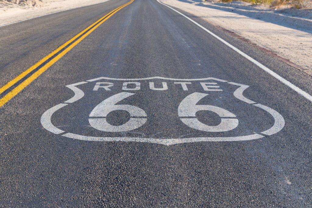 Trip, travel and drive concept - route 66 asphalt road in united states of america