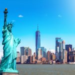 The Statue of Liberty with the One world Trade building center over hudson river and New York cityscape background, Landmarks of lower manhattan New York city. Architecture and building concept