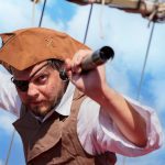 Pirate captain traveler discoverer and explorer on the vintage pirate ship