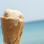 melted ice cream cone in a waffle cone under the sun