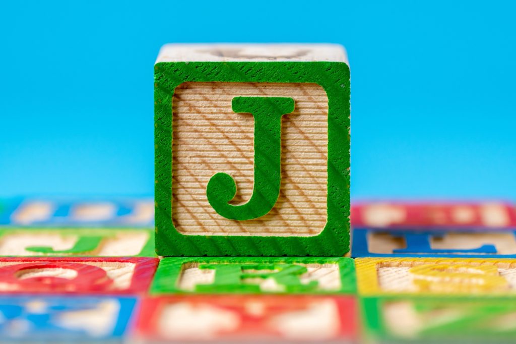 The letter "J" of education alphabet ABC wooden block