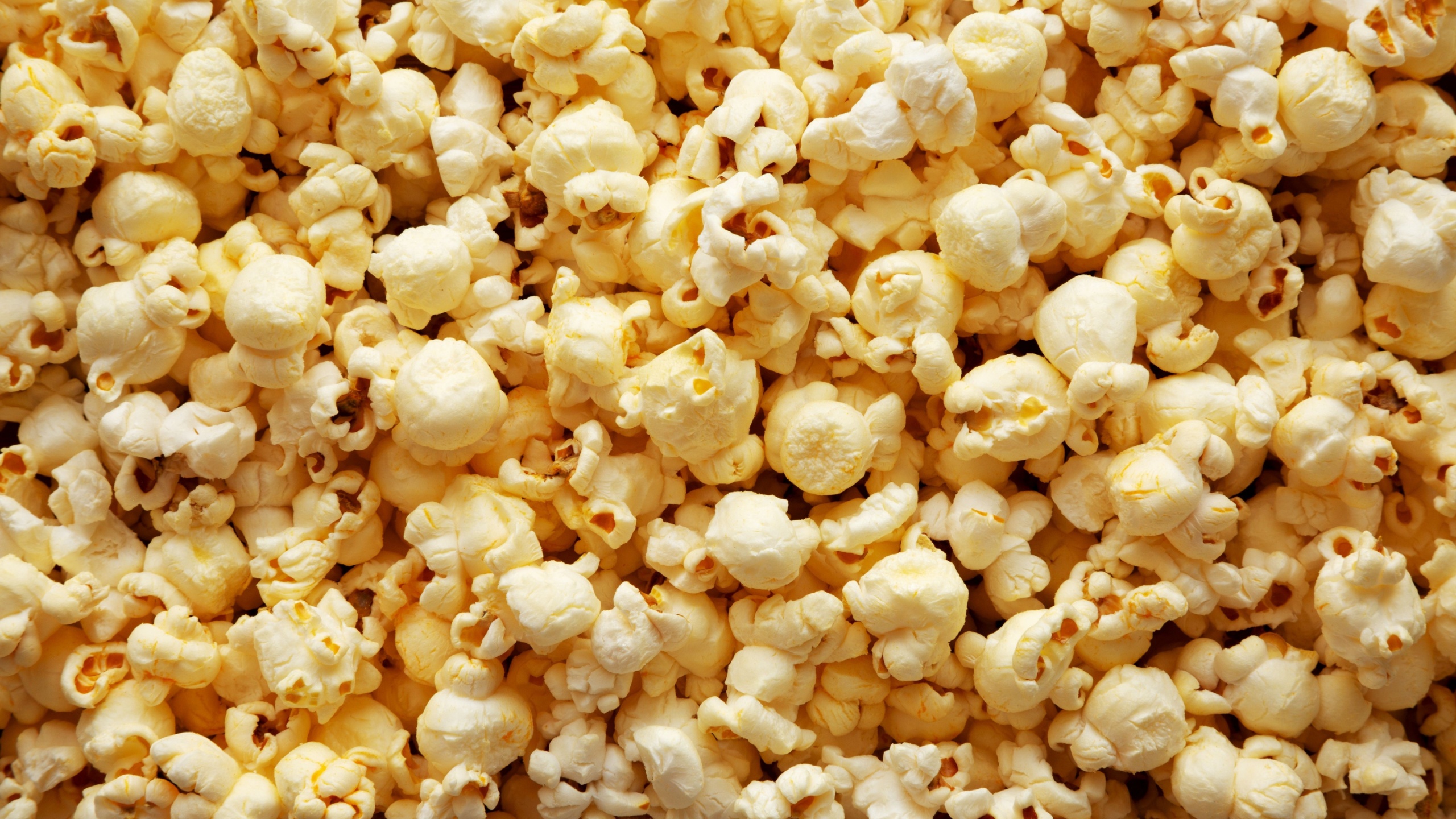 Homemade Salty Popcorn, top view. Flat lay, overhead, from above. 