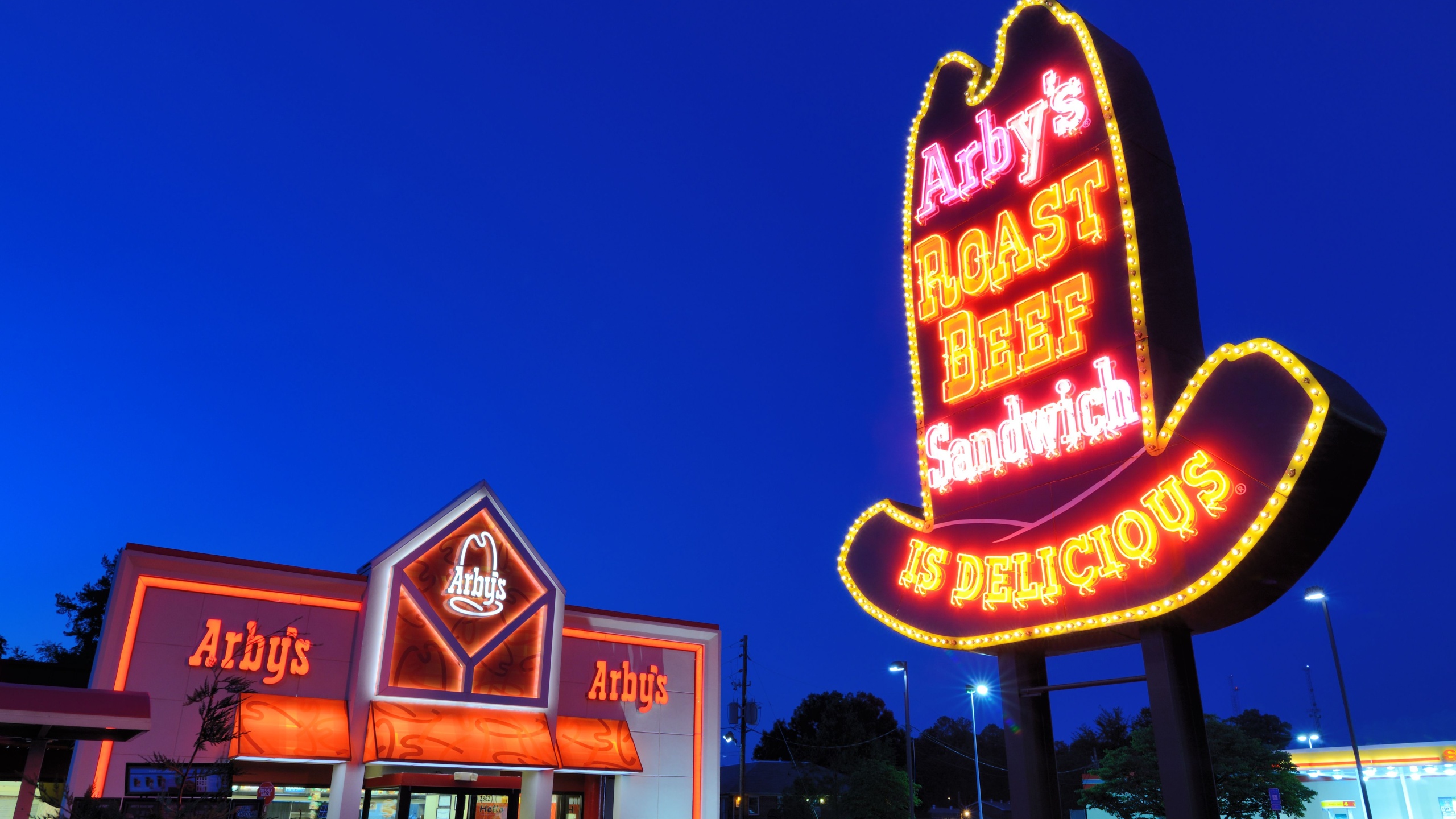 ATHENS, GEORGIA - MAY 5: A classic Arby's "hat" sign at a restaurant May 5, 2012 in Athens, GA. With over 3,600 locations globally, the fast-food chain has been replacing their signs with modern ones.