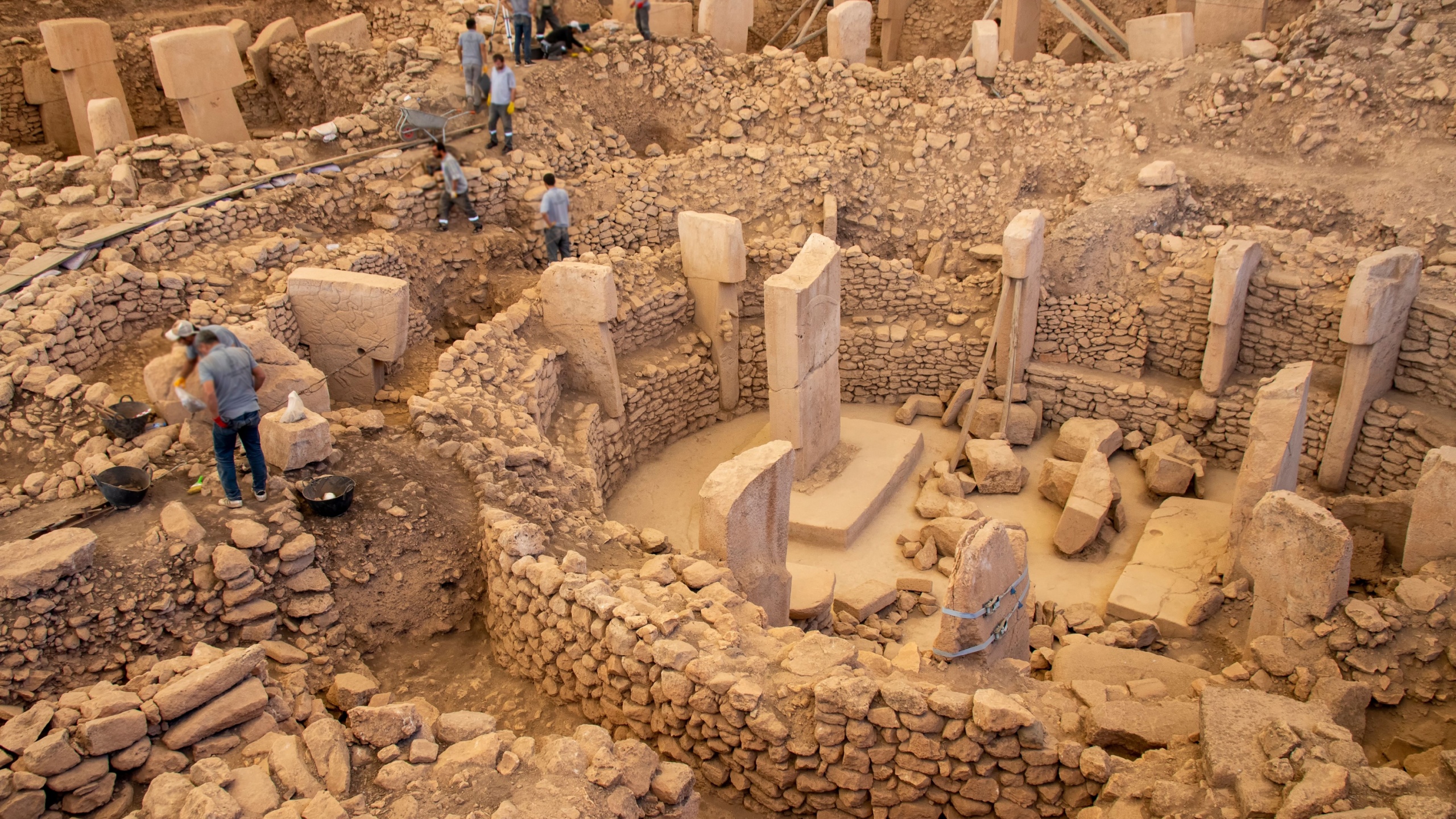 Archaeologists Unearth Ancient Secrets at Gobekli Tepe. Archaeologists meticulously excavate the prehistoric site of Gobekli Tepe in Turkey, revealing T-shaped pillars, circular enclosures, and stone