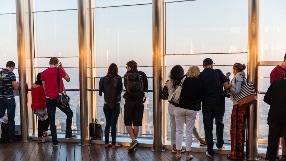 DUBAI, UAE - JANUARY 02: people at the top the observation deck of the highest building in the world Burj al Khalifa on January 02, 2015 in Dubai, United Arab Emirates